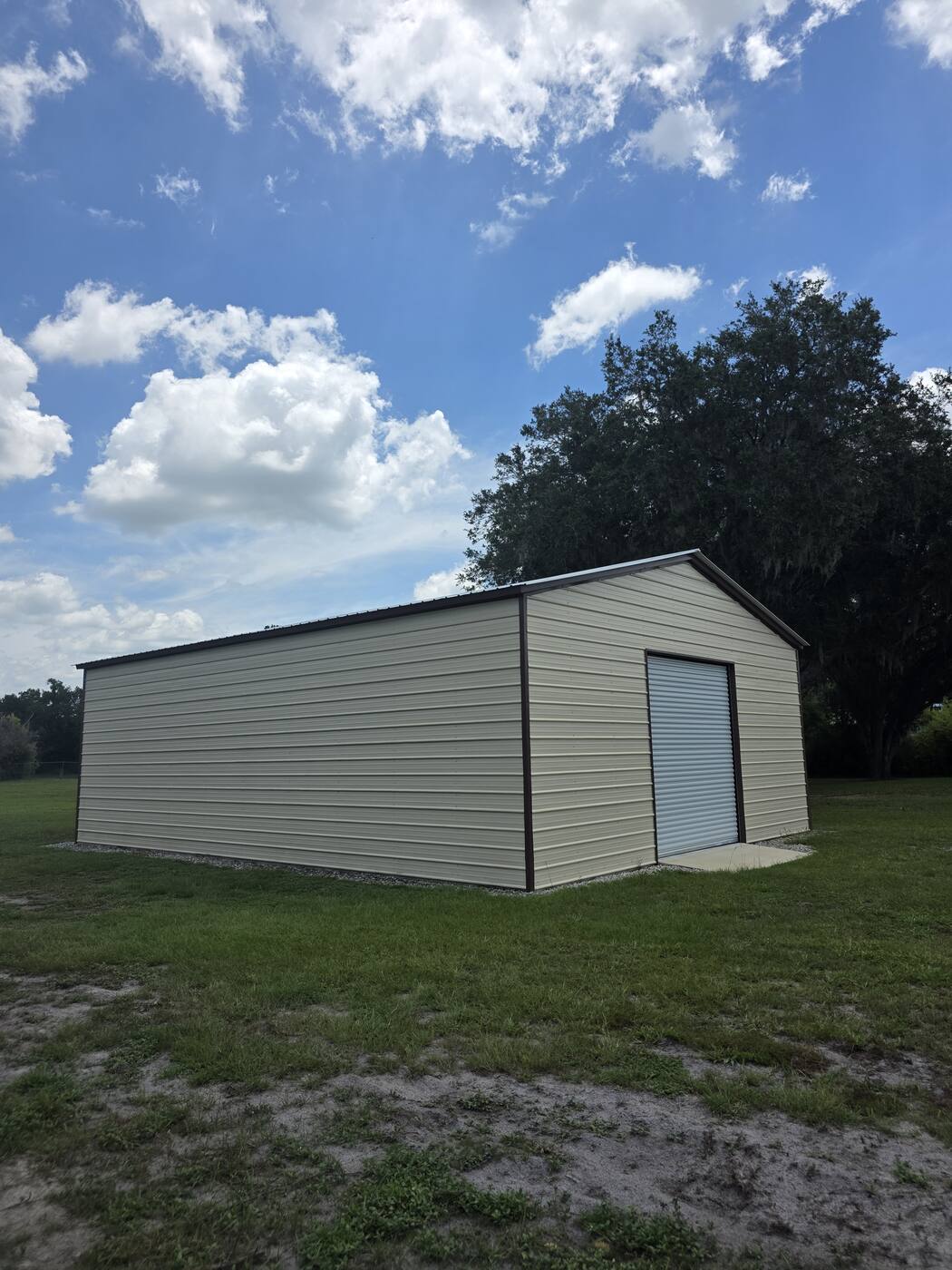 Completed metal building with roll-up door